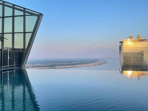 a cruise ship in a body of water at P Residence Phnom Penh in Phnom Penh