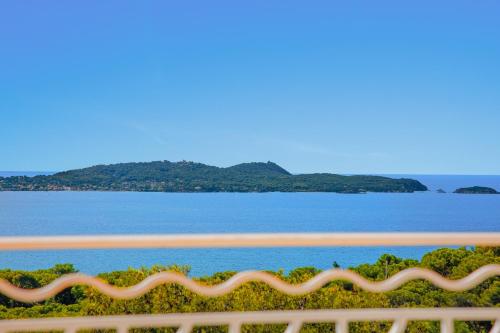 a view of the ocean from the balcony of a resort at Duplex d'exception face à la mer in Hyères