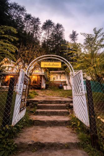 an entrance to a building with a gate at Peakaboo Manali in Manāli