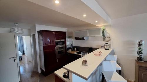 T3 en Première ligne vue bassin, proche commerces