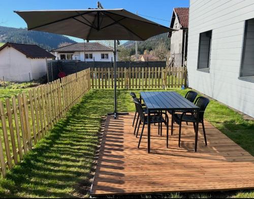 Appartement cosy avec jardin clôturé et barbecue