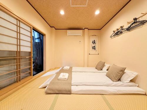难波4分钟车站旁 机场直达 通天阁 心斋桥 梅田 Usj 全新日式 2卧室1厨1卫1浴 最大5人
