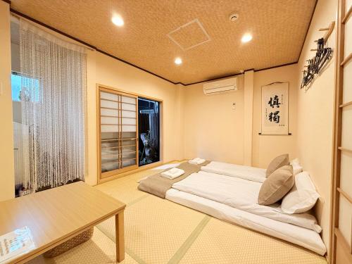 难波4分钟车站旁 机场直达 通天阁 心斋桥 梅田 Usj 全新日式 2卧室1厨1卫1浴 最大5人