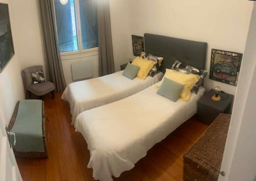 Llit o llits en una habitació de LA PHOCEENNE