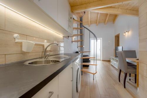 Almadena grey house