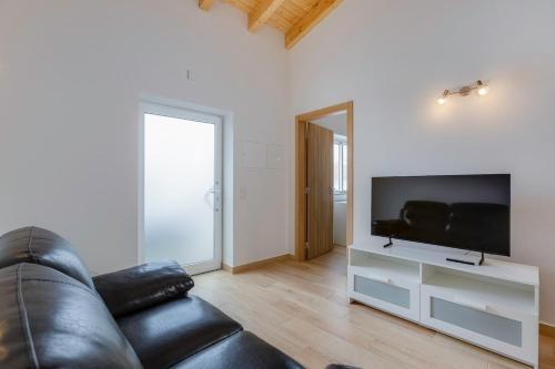 Almadena grey house