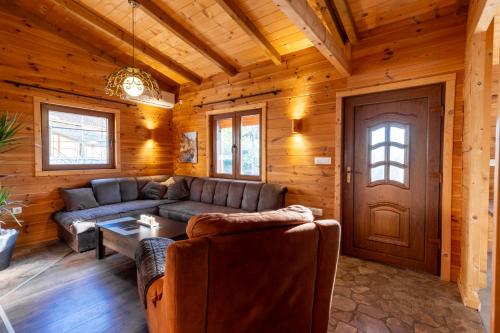a living room with a couch and a table at Zabes Home in Zabes