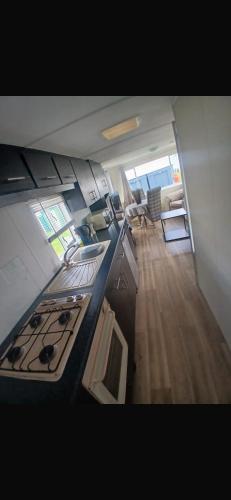 an overhead view of a kitchen with a stove at Y29 golden anchor in Chapel Saint Leonards