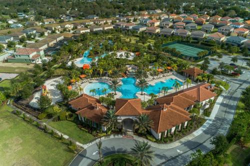 an aerial view of a resort with a pool at 6 Bedrooms 5.5 Bathrooms Solterra 4193 OD in Orlando
