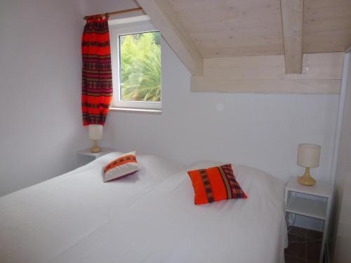 Tempat tidur dalam kamar di Villa Fede