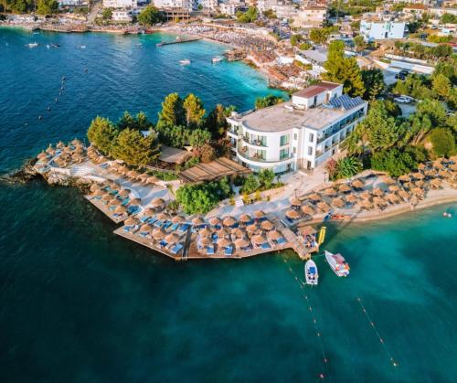 an aerial view of a resort on the water at Manta Hotel in Ksamil