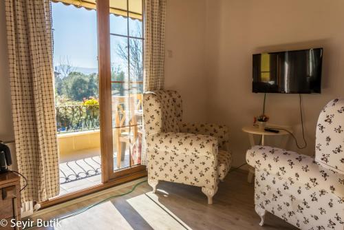 TV a/nebo společenská místnost v ubytování İznik Seyir Otel