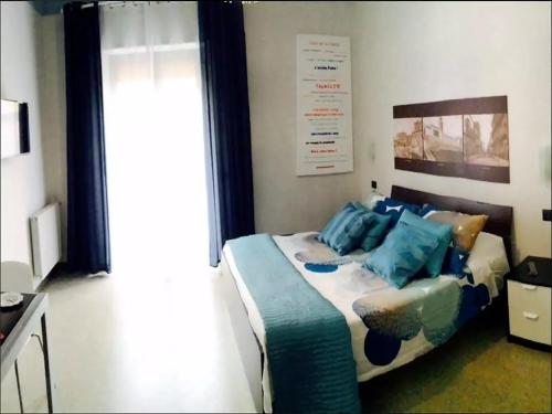 Un pat sau paturi într-o cameră la Palladio B&B