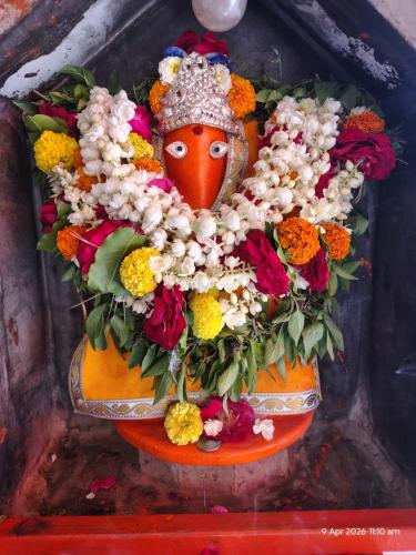 a painting of a vase filled with flowers at आदिशक्ति भवन in Mirzāpur