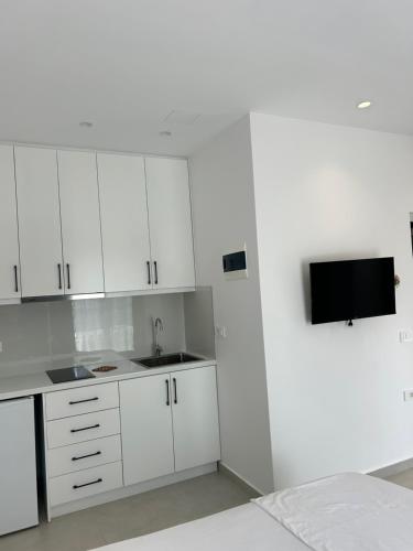 Kuchyň nebo kuchyňský kout v ubytování Maizon Rooms