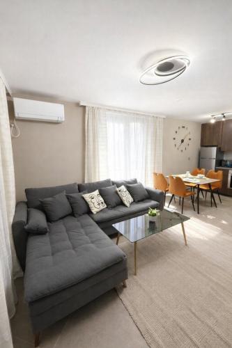 a living room with a couch and a table at Fresh SPA Relax Velingrad in Velingrad