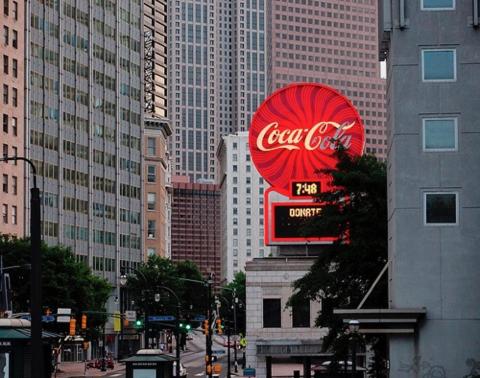 a cocacola sign on a building in a city at Downtown 1 Bedroom Apartment 18H in Atlanta