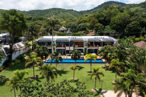 an aerial view of a resort with a swimming pool at Beachfront! 2 Bedroom Apartment A3 - 110 Sqm in Ko Lanta