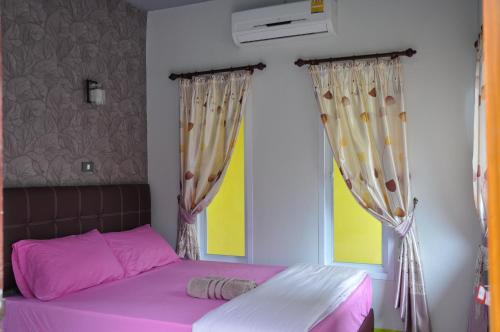 Llit o llits en una habitació de Feel Good Resort