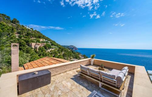 a view of the ocean from the balcony of a house at Vistamar in Canyamel