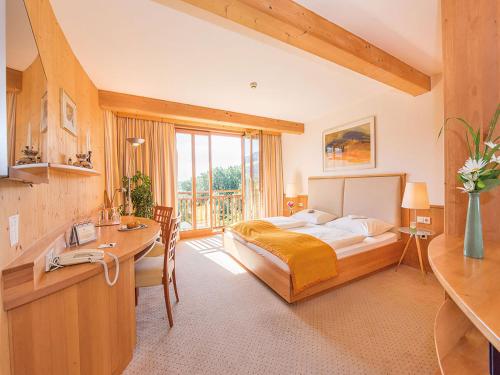 Postel nebo postele na pokoji v ubytování RETTER Bio-Natur-Resort