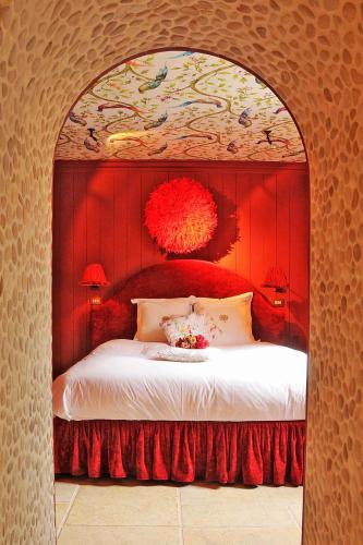Postel nebo postele na pokoji v ubytování Exclusive Suites The Secret Garden