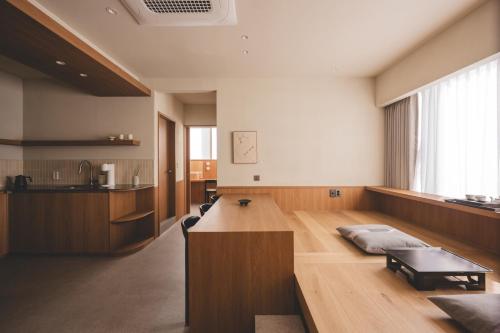 a living room with a couch and a table at 아랑재 arangjae in Seoul