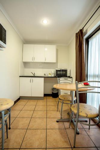 Kuchyň nebo kuchyňský kout v ubytování Pialba Motor Inn