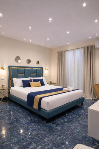 a large bedroom with a large bed in a room at Sicily Luxury Suites in Palermo