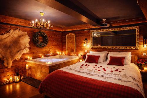 Le Chalet romantique, SPA XXL, 5 min centre ville, Écran cinéma, Lit king size, cascade d'eau