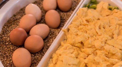two containers filled with eggs and some corn starch at Hotel Mutz Garni in Inning am Ammersee
