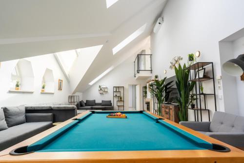 a living room with a pool table at Sky Garden Vienna in Vienna