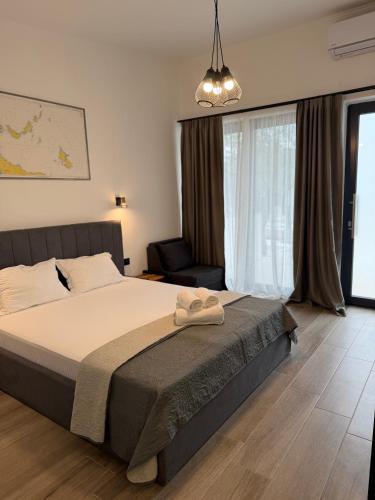 The Olive Hills tesisinde bir odada yatak veya yataklar