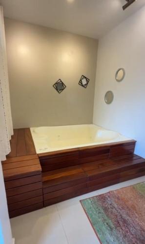 a room with a bath tub in a room at Hotel Ucla Center in Valledupar