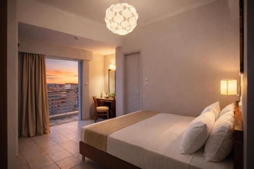 Krevet ili kreveti u jedinici u okviru objekta Epidavros Hotel