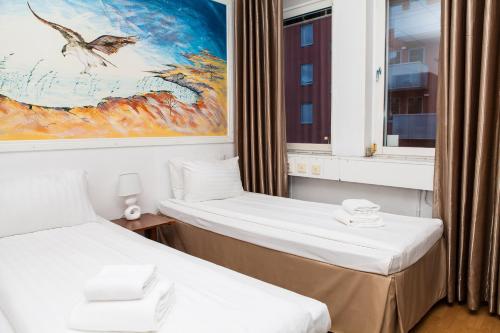 Säng eller sängar i ett rum på Hotel Expo Stockholm