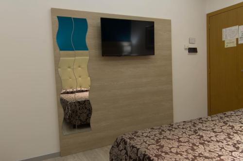 Hotel Baffo Rossoにあるテレビまたはエンターテインメントセンター