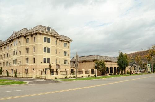a large building on the side of a street at Penn Wells Lodge in Wellsboro
