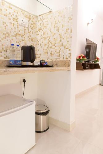 Kuchyň nebo kuchyňský kout v ubytování Cochichos Resort