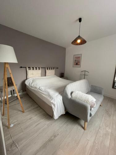 Tempat tidur dalam kamar di Champoiseau