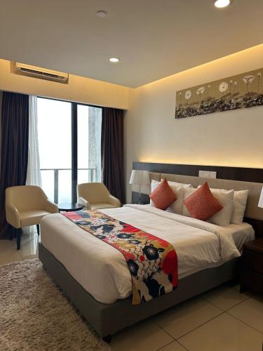 a bedroom with a large bed in a room at The Yanné, Onsen Hotel in Genting Highlands