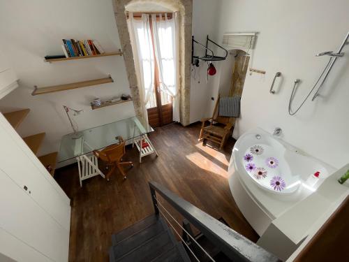 an overhead view of a bathroom with a sink at La Baita nel Borgo HOWME in Bari