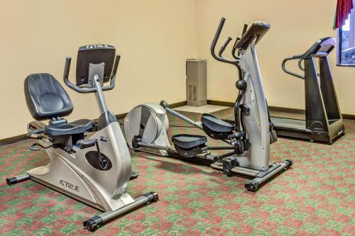 a gym with two exercise bikes on the floor at Ramada by Wyndham Murfreesboro in Murfreesboro