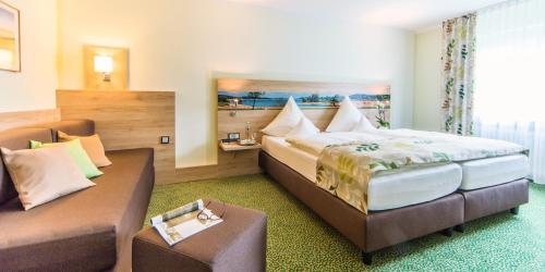 Katil atau katil-katil dalam bilik di Ambient Hotel am Europakanal