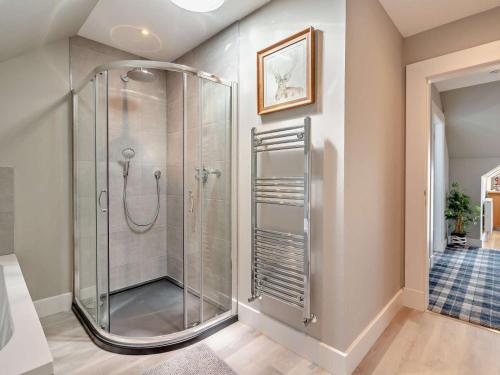 a glass shower in a bathroom with at 2 Bed in Auchterarder oc-94546 in Auchterarder