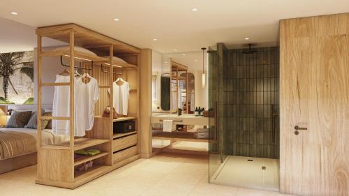 a dressing room with a bed and a mirror at HD Sensarena - Adults Only in Costa Teguise