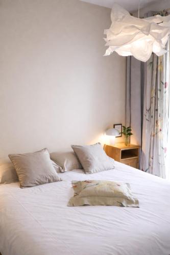 Giường trong phòng chung tại Hotel