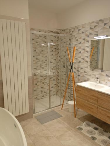 a bathroom with a shower and a sink at Casa Don Peppì in Monopoli