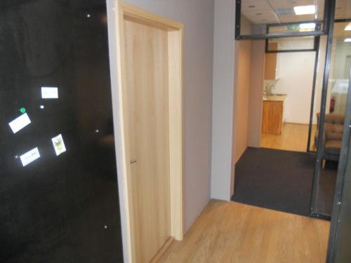 an open door to a room with a bed at REK Inn in Reykjavík