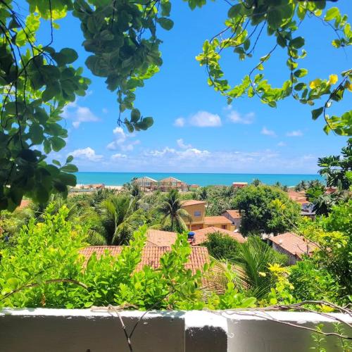 a view of the ocean from a house at Casa de Mar - Praia do Sagi in Baía Formosa